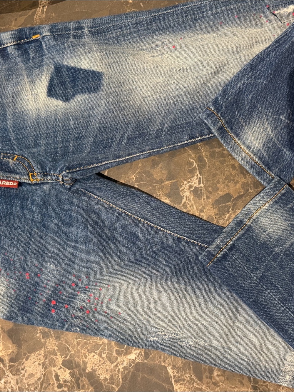 DSQUARED2 Men's Blue Slim Straight Jeans with Red Paint Splatter